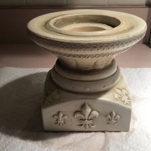 Vintage Candle Holder. Fleurs design on the base. Flawless.